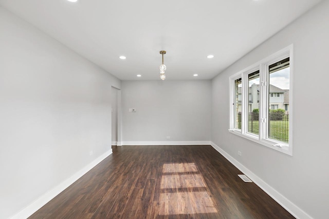 7729 W 157th Pl, Orland Park, IL 60462 - spare room with dark wood finished floors, recessed lighting, and baseboards