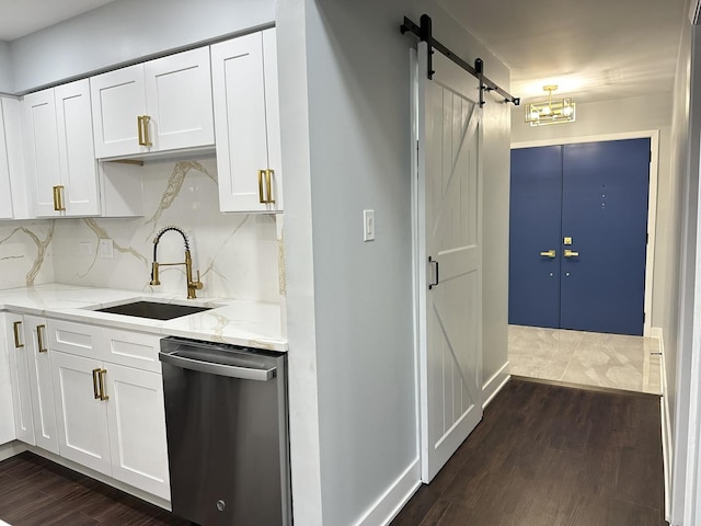 7729 W 157th Pl, Orland Park, IL 60462 - kitchen with dishwasher, a sink, a barn door, and dark wood-style flooring