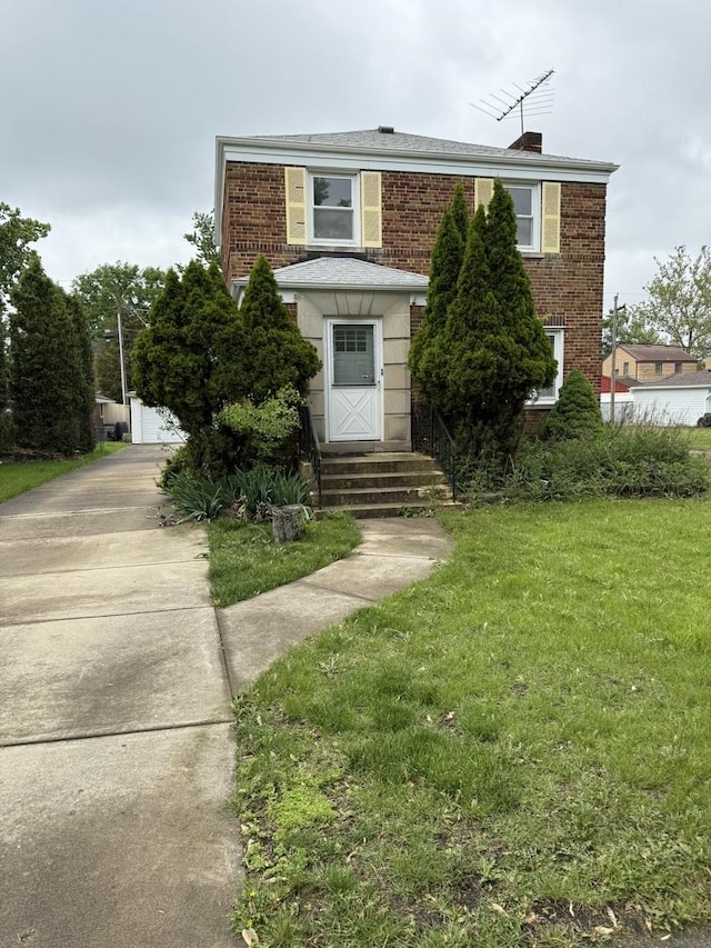 2452 S 6th Ave, North Riverside, IL 60546 - view of front of home featuring brick siding, entry steps, a front lawn, and a chimney