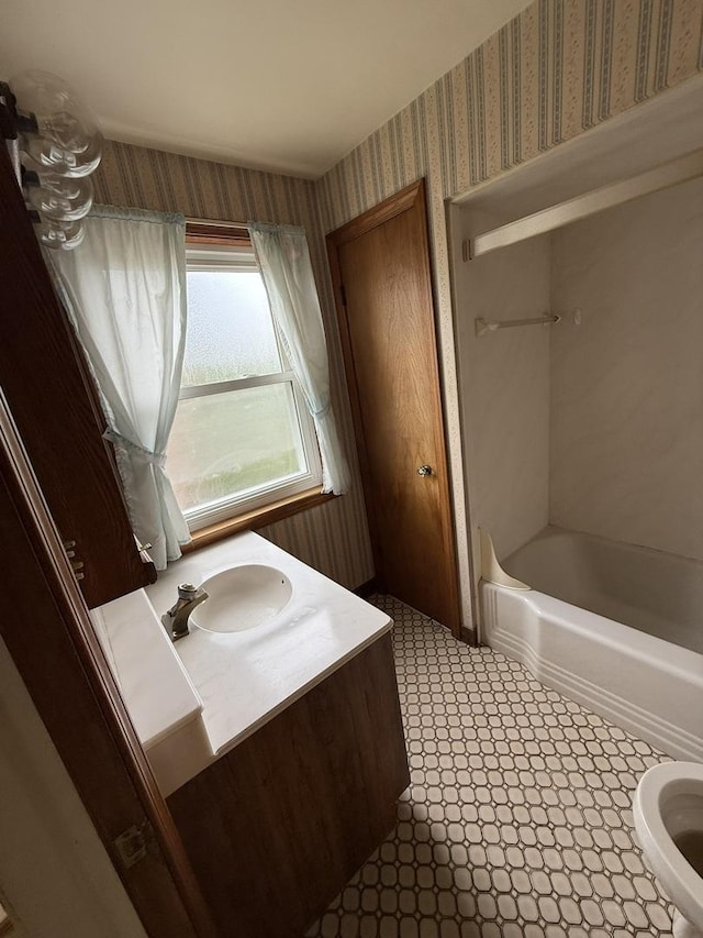 2452 S 6th Ave, North Riverside, IL 60546 - full bath featuring wallpapered walls, vanity, toilet, and bathing tub / shower combination