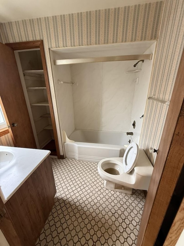 2452 S 6th Ave, North Riverside, IL 60546 - full bath with toilet, wallpapered walls, vanity, tile patterned floors, and tub / shower combination