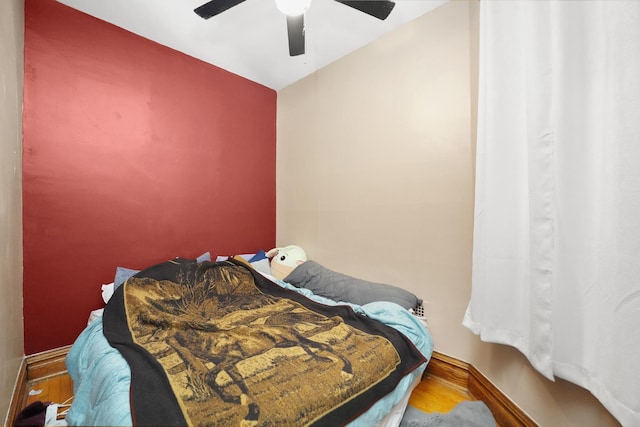 1518 N Kedzie Ave, Chicago, IL 60651 - bedroom featuring wood finished floors, baseboards, and a ceiling fan
