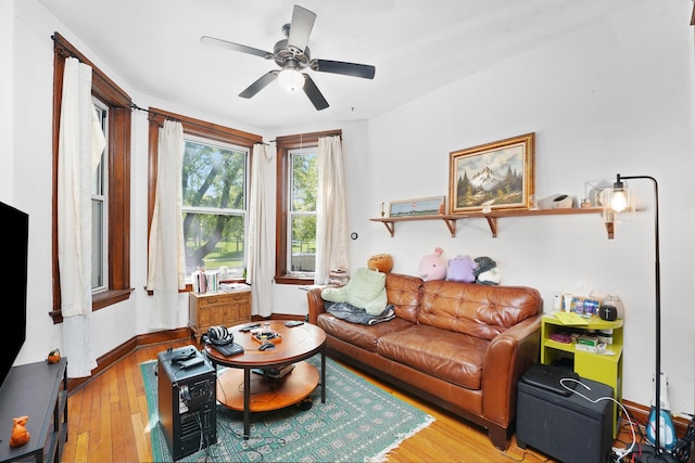 1518 N Kedzie Ave, Chicago, IL 60651 - living area with wood finished floors, ceiling fan, and baseboards