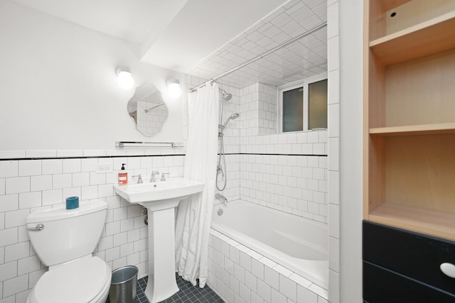 1518 N Kedzie Ave, Chicago, IL 60651 - full bath featuring tiled shower / bath, toilet, tile walls, tile patterned flooring, and a sink