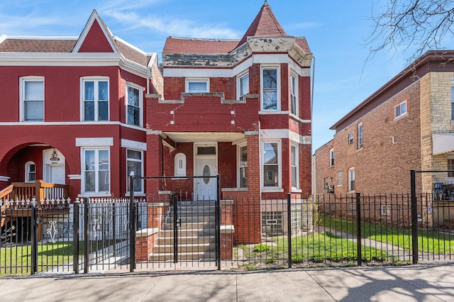 2439 S Millard Ave, Chicago, IL 60623 - view of front of home with brick siding and a fenced front yard