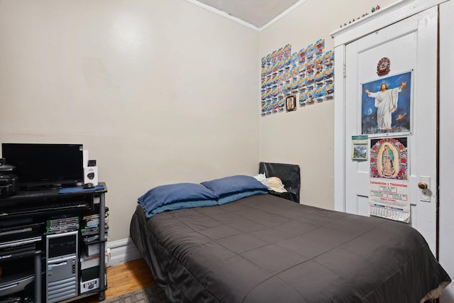 2439 S Millard Ave, Chicago, IL 60623 - bedroom with wood finished floors and ornamental molding