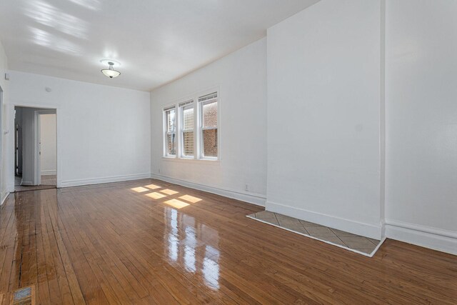 2439 S Millard Ave, Chicago, IL 60623 - spare room featuring hardwood / wood-style floors and baseboards