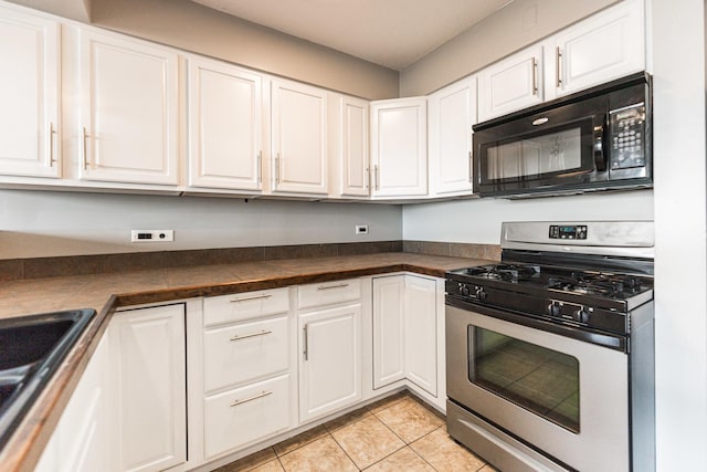 7234 W N Ave Unit 1608, Elmwood Park, IL 60707 - kitchen featuring stainless steel gas range, black microwave, white cabinetry, dark countertops, and light tile patterned floors