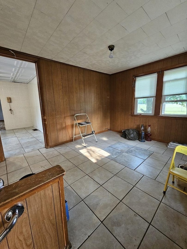 3500 Butler Ave, Steger, IL 60475 - unfurnished room featuring wood walls and light tile patterned floors