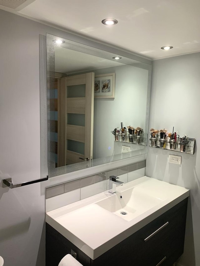 6430 W Belle Plaine Ave Unit 202, Chicago, IL 60634 - bathroom with vanity and recessed lighting