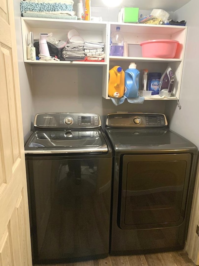 6430 W Belle Plaine Ave Unit 202, Chicago, IL 60634 - laundry area featuring washer and dryer and wood finished floors