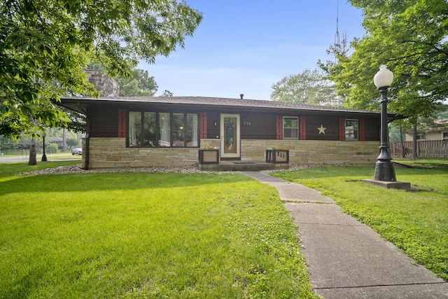 211 S E St, Hudson, IL 61748 - single story home featuring stone siding