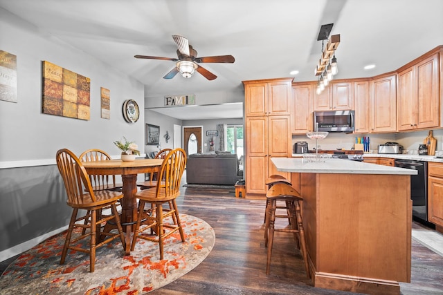 211 S E St, Hudson, IL 61748 - dining room featuring ceiling fan, dark wood finished floors, and recessed lighting