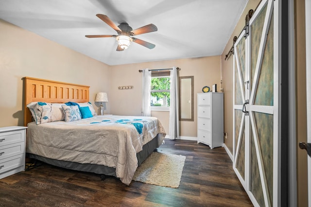 211 S E St, Hudson, IL 61748 - bedroom with dark wood-style floors, baseboards, and a ceiling fan