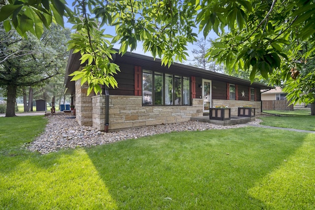 211 S E St, Hudson, IL 61748 - view of front of house featuring stone siding