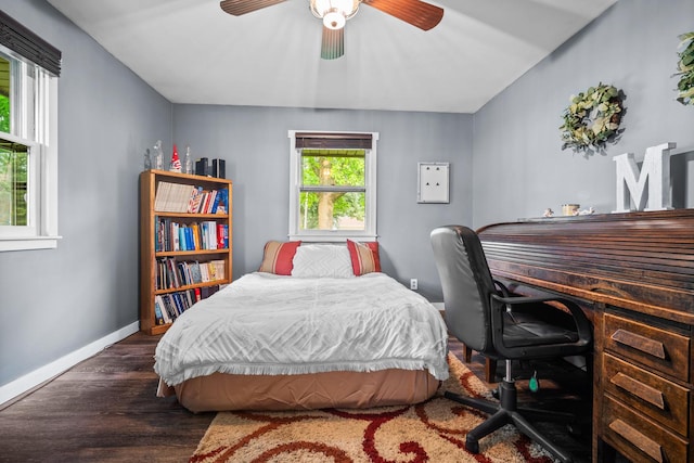211 S E St, Hudson, IL 61748 - bedroom with wood finished floors, baseboards, and a ceiling fan