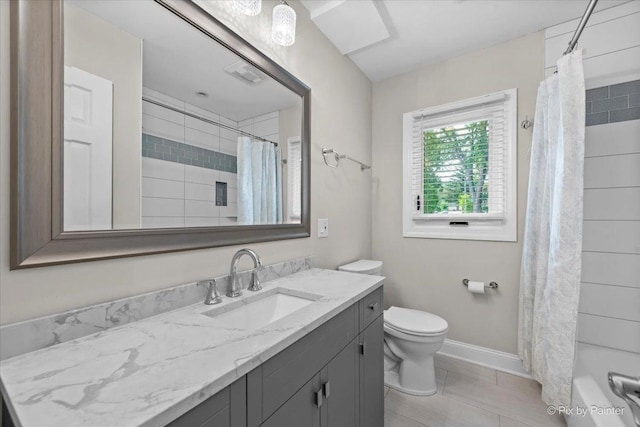 1599 Lowe Dr, Algonquin, IL 60102 - full bath featuring vanity, toilet, shower / bath combination with curtain, baseboards, and tile patterned flooring