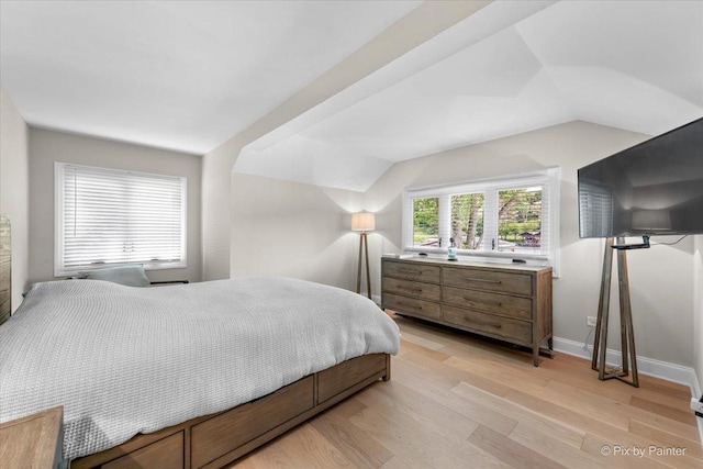 1599 Lowe Dr, Algonquin, IL 60102 - bedroom featuring light wood-style floors, vaulted ceiling, and baseboards