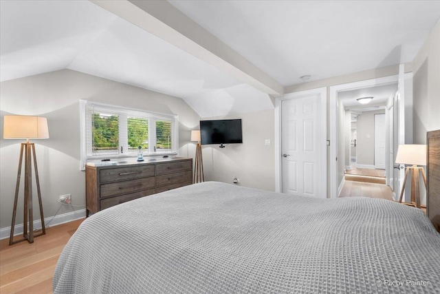 1599 Lowe Dr, Algonquin, IL 60102 - bedroom with light wood finished floors, baseboards, and lofted ceiling