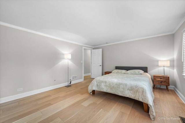 1599 Lowe Dr, Algonquin, IL 60102 - bedroom featuring light wood-type flooring, ornamental molding, and baseboards
