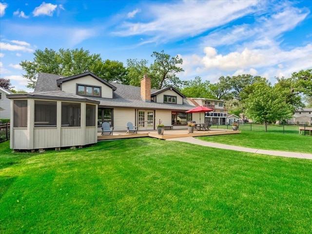 1599 Lowe Dr, Algonquin, IL 60102 - rear view of house featuring a deck, a sunroom, a shingled roof, a chimney, and french doors