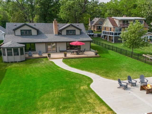 1599 Lowe Dr, Algonquin, IL 60102 - back of house featuring a fire pit, a wooden deck, a chimney, french doors, and roof with shingles