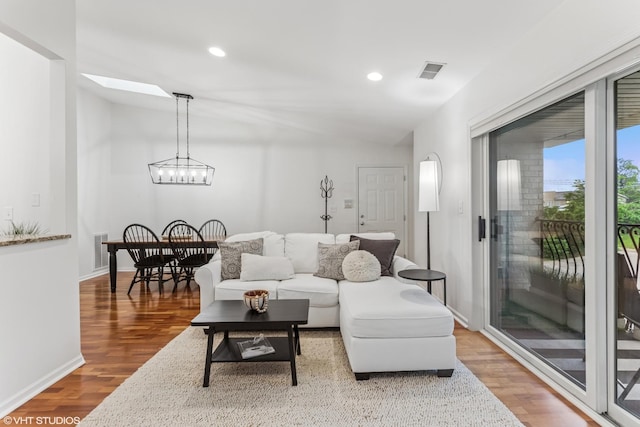 4400 Pershing Ave Unit 3S, Downers Grove, IL 60515 - living area featuring wood finished floors, recessed lighting, a chandelier, and baseboards
