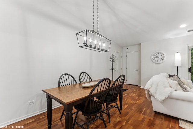 4400 Pershing Ave Unit 3S, Downers Grove, IL 60515 - dining space featuring a chandelier, dark wood-style floors, and baseboards