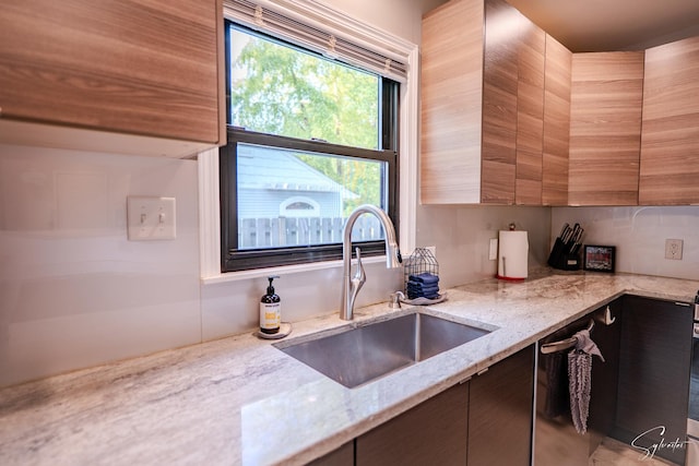 545 Delaware Dr, Lake In The Hills, IL 60156 - kitchen featuring light stone countertops and modern cabinets