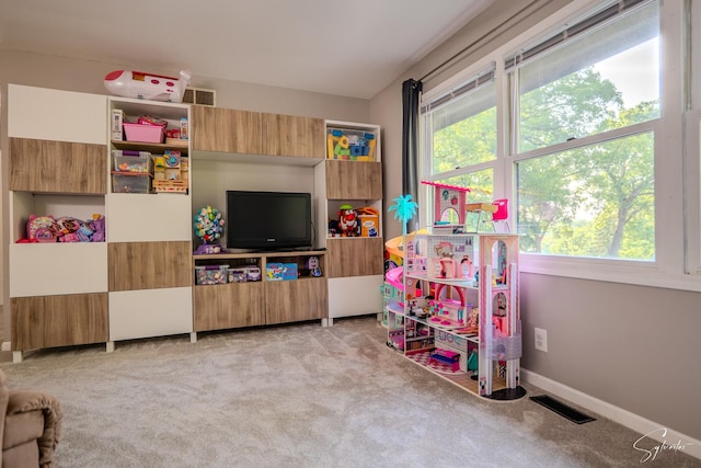 545 Delaware Dr, Lake In The Hills, IL 60156 - rec room with light carpet