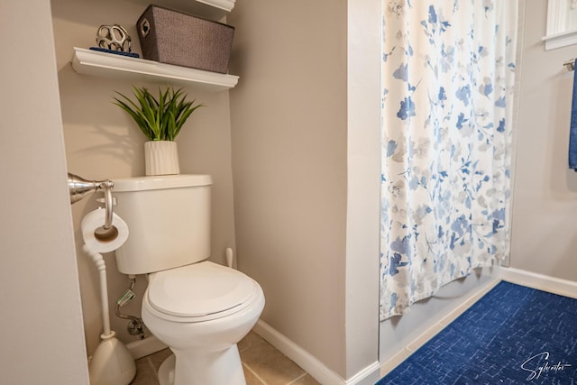 545 Delaware Dr, Lake In The Hills, IL 60156 - bathroom with tile patterned floors and shower / bath combo