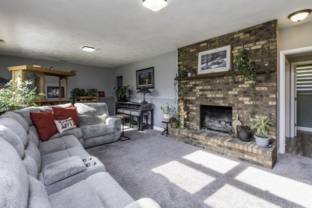 1401 Funderburk Dr, Winthrop Harbor, IL 60096 - living area featuring carpet flooring, a fireplace, and baseboards