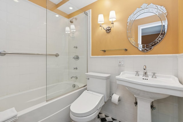 3500 N Lake Shore Dr Unit 5D, Chicago, IL 60657 - full bathroom featuring bathing tub / shower combination, tile walls, and wainscoting
