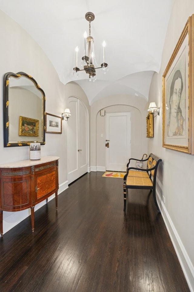 3500 N Lake Shore Dr Unit 5D, Chicago, IL 60657 - foyer with a chandelier, hardwood / wood-style floors, arched walkways, and vaulted ceiling