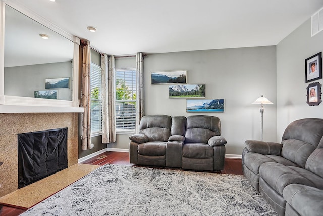 200 St James Pkwy, Sugar Grove, IL 60554 - living room with wood finished floors, baseboards, and a fireplace
