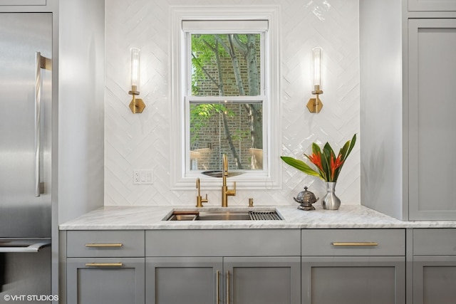 2319 W Shakespeare St, Chicago, IL 60647 - bar featuring high end fridge, a sink, and tasteful backsplash