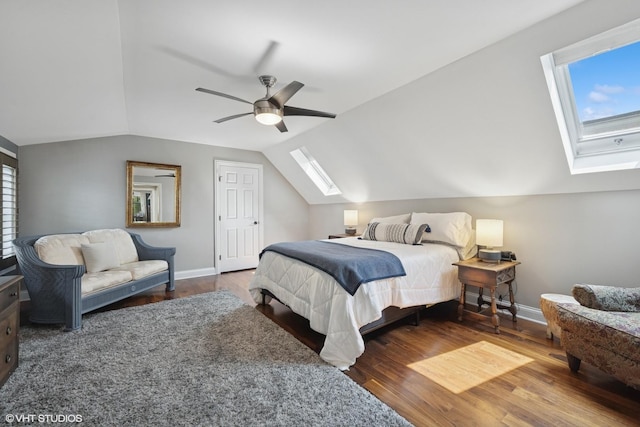 2319 W Shakespeare St, Chicago, IL 60647 - bedroom with a skylight, lofted ceiling, wood finished floors, ceiling fan, and baseboards