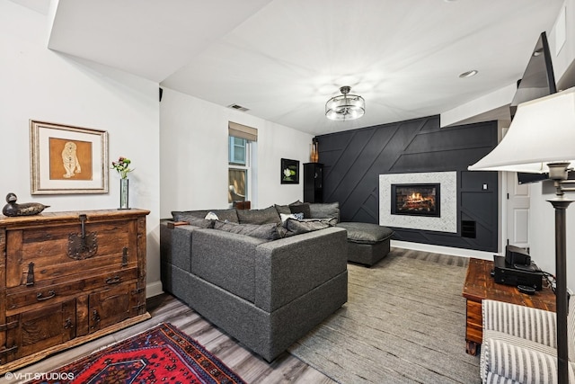 2319 W Shakespeare St, Chicago, IL 60647 - living room with wood finished floors, a large fireplace, and baseboards