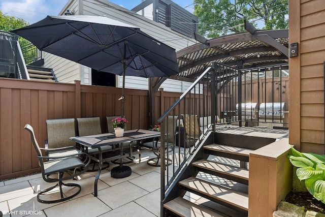 2319 W Shakespeare St, Chicago, IL 60647 - view of patio / terrace featuring stairs and outdoor dining area