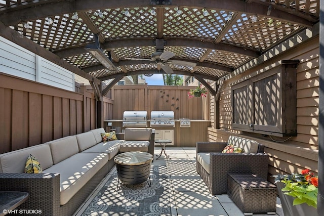 2319 W Shakespeare St, Chicago, IL 60647 - wooden terrace featuring an outdoor living space, a pergola, a fenced backyard, a ceiling fan, and a patio