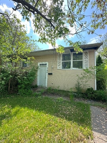 1764 Ross Cres, Sauk Village, IL 60411 - view of side of property with a lawn