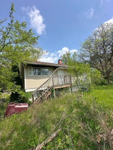 1764 Ross Cres, Sauk Village, IL 60411 - back of house featuring a chimney
