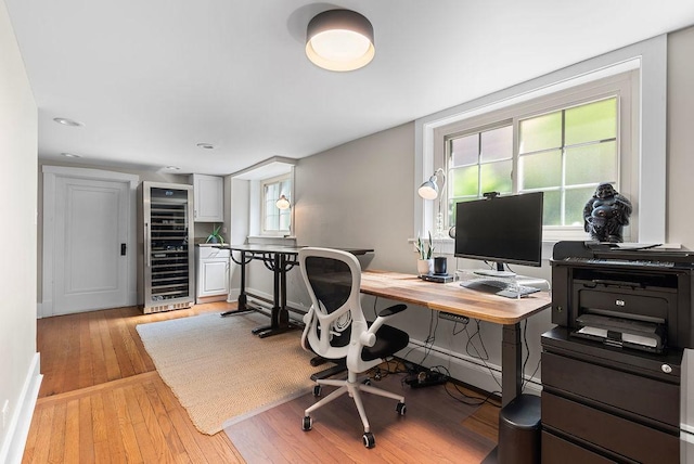 2530 W Morse Ave, Chicago, IL 60645 - home office featuring beverage cooler, light wood-type flooring, and recessed lighting