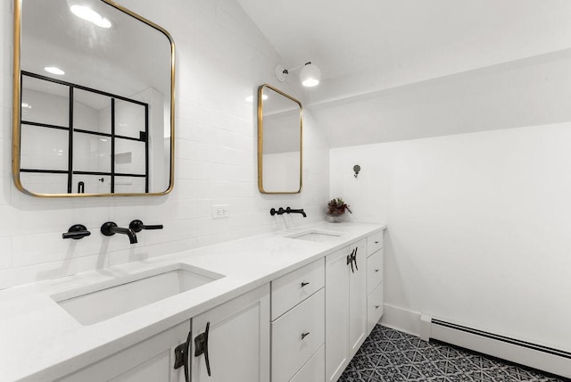 2530 W Morse Ave, Chicago, IL 60645 - bathroom featuring a baseboard radiator, lofted ceiling, double vanity, and a shower