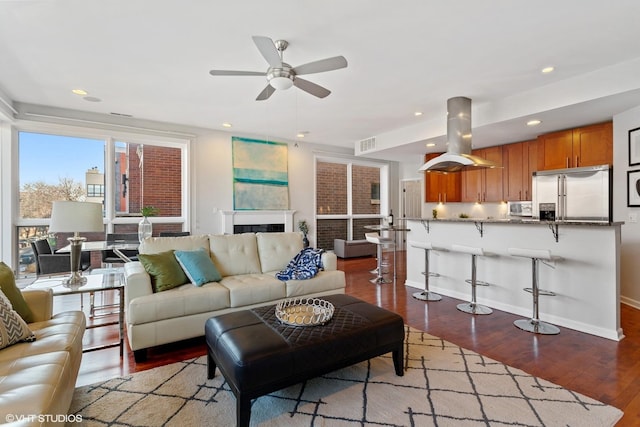 2315 W Wabansia Ave Unit 3Ne, Chicago, IL 60647 - living room with ceiling fan, wood finished floors, baseboards, and recessed lighting