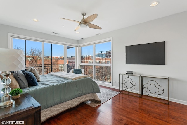 2315 W Wabansia Ave Unit 3Ne, Chicago, IL 60647 - bedroom featuring baseboards, multiple windows, wood finished floors, and recessed lighting