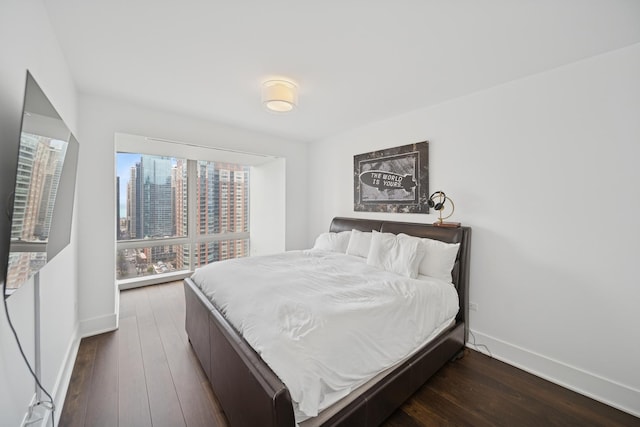 363 E Wacker Dr Unit 1602, Chicago, IL 60601 - bedroom with baseboards and dark wood-style floors