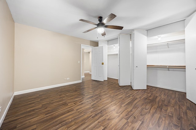 5515 Lakeside Dr Unit 1D, Lisle, IL 60532 - unfurnished bedroom featuring baseboards, dark wood-type flooring, two closets, and a ceiling fan