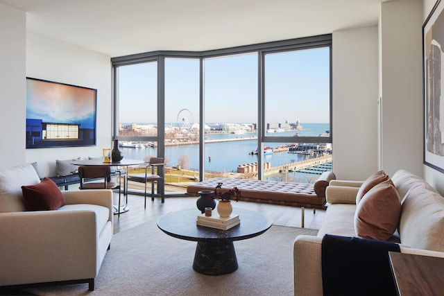 211 N Harbor Dr Unit 1404, Chicago, IL 60601 - living area with a water view, expansive windows, wood finished floors, and view of marina