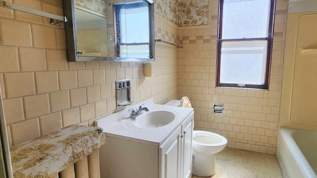 5330 W Foster Ave, Chicago, IL 60630 - bathroom featuring tile walls, a bath, vanity, and a shower